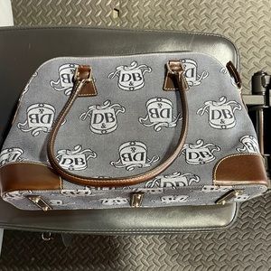 Dooney and Bourke domed satchel, denim blue and brown with wristlet!